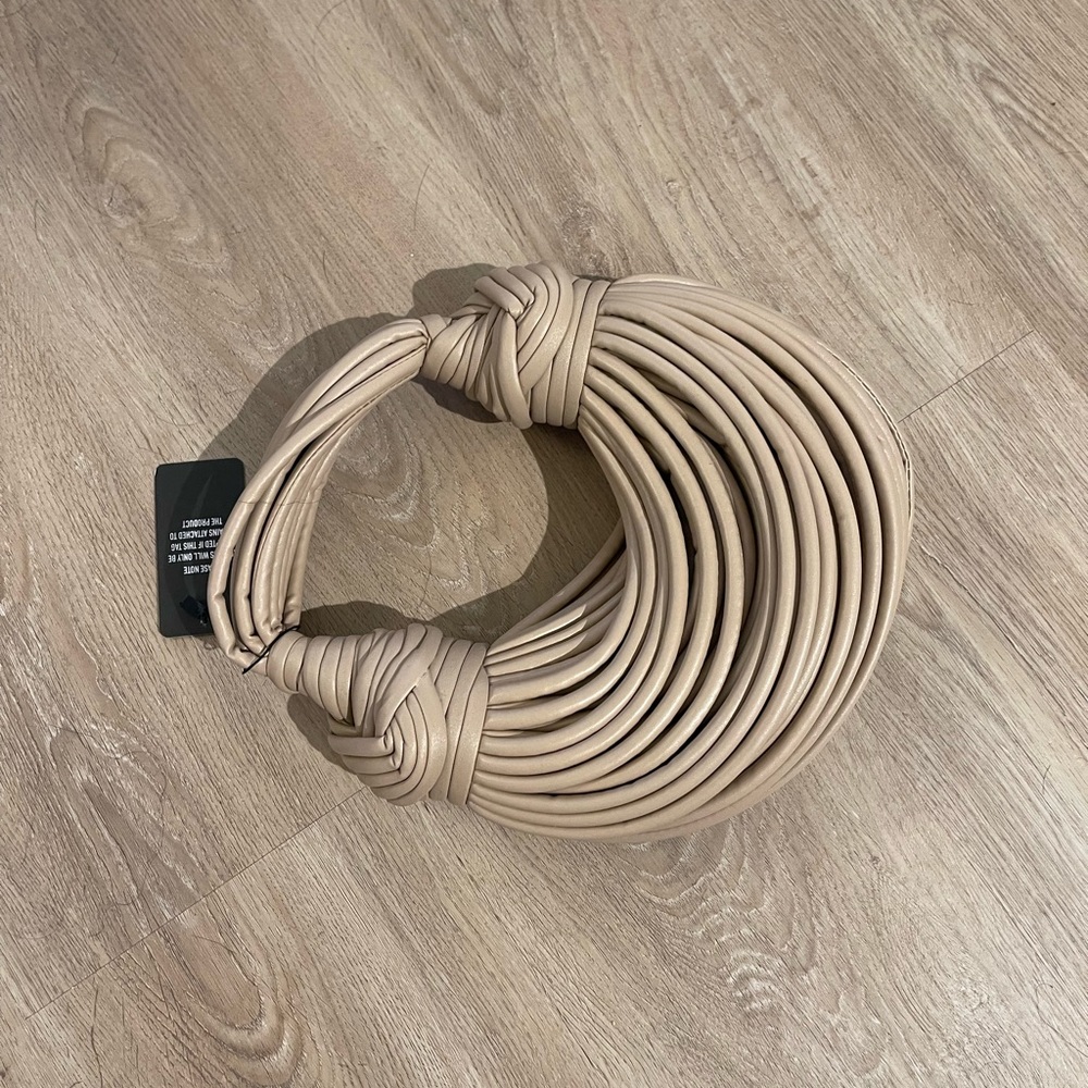 Tan purse from EGO. Brand new. Tags still on it.